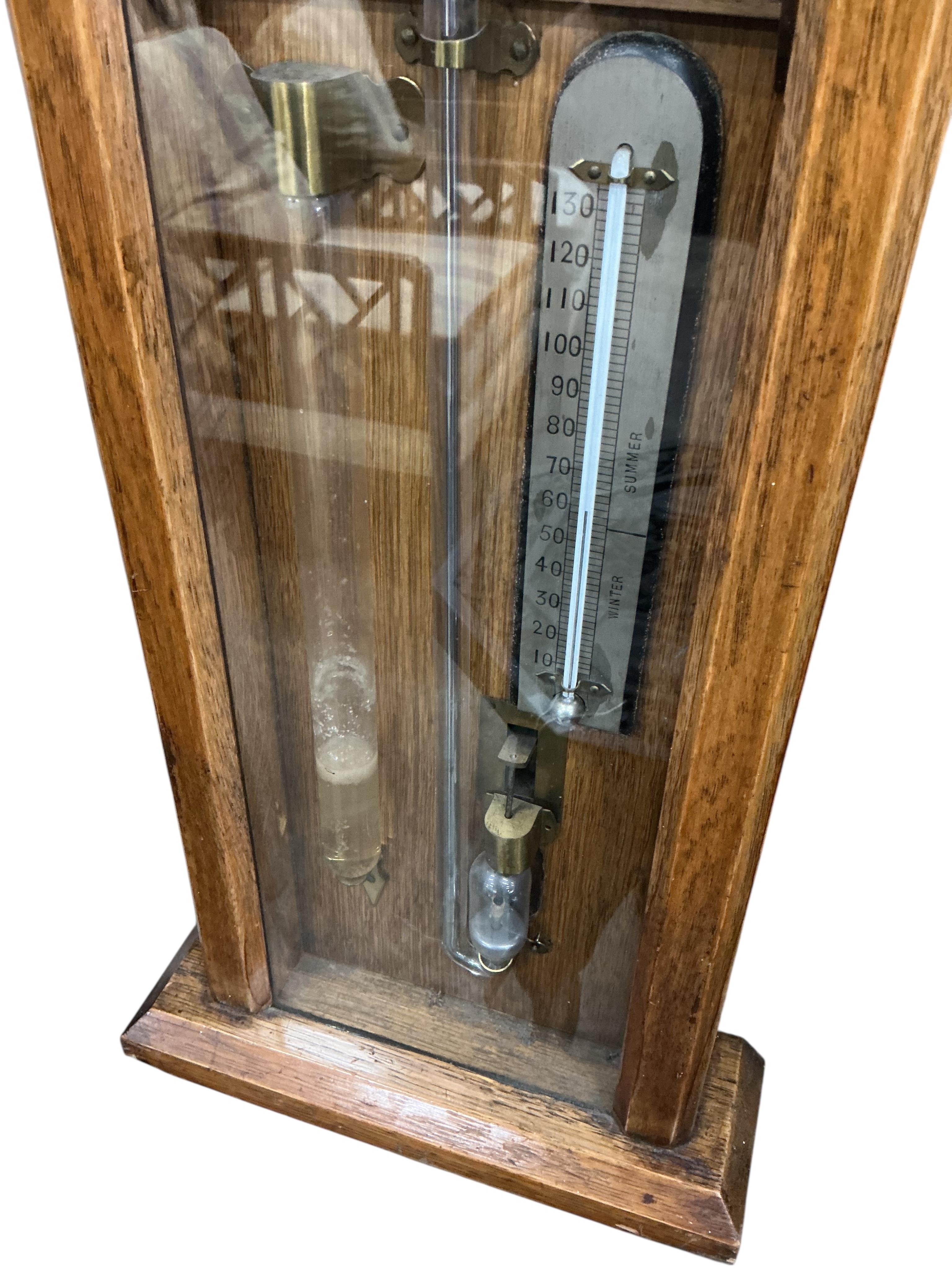 A late Victorian oak Admiral Fitzroy barometer, height 116cm